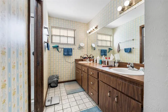 a kitchen with a sink and a window