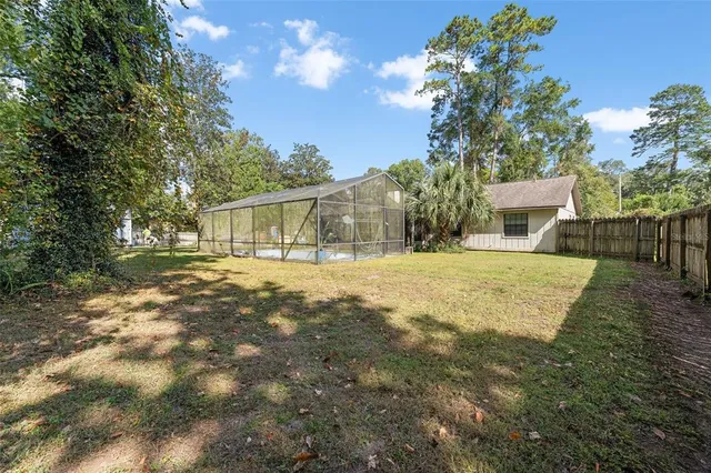 a view of house with outdoor space