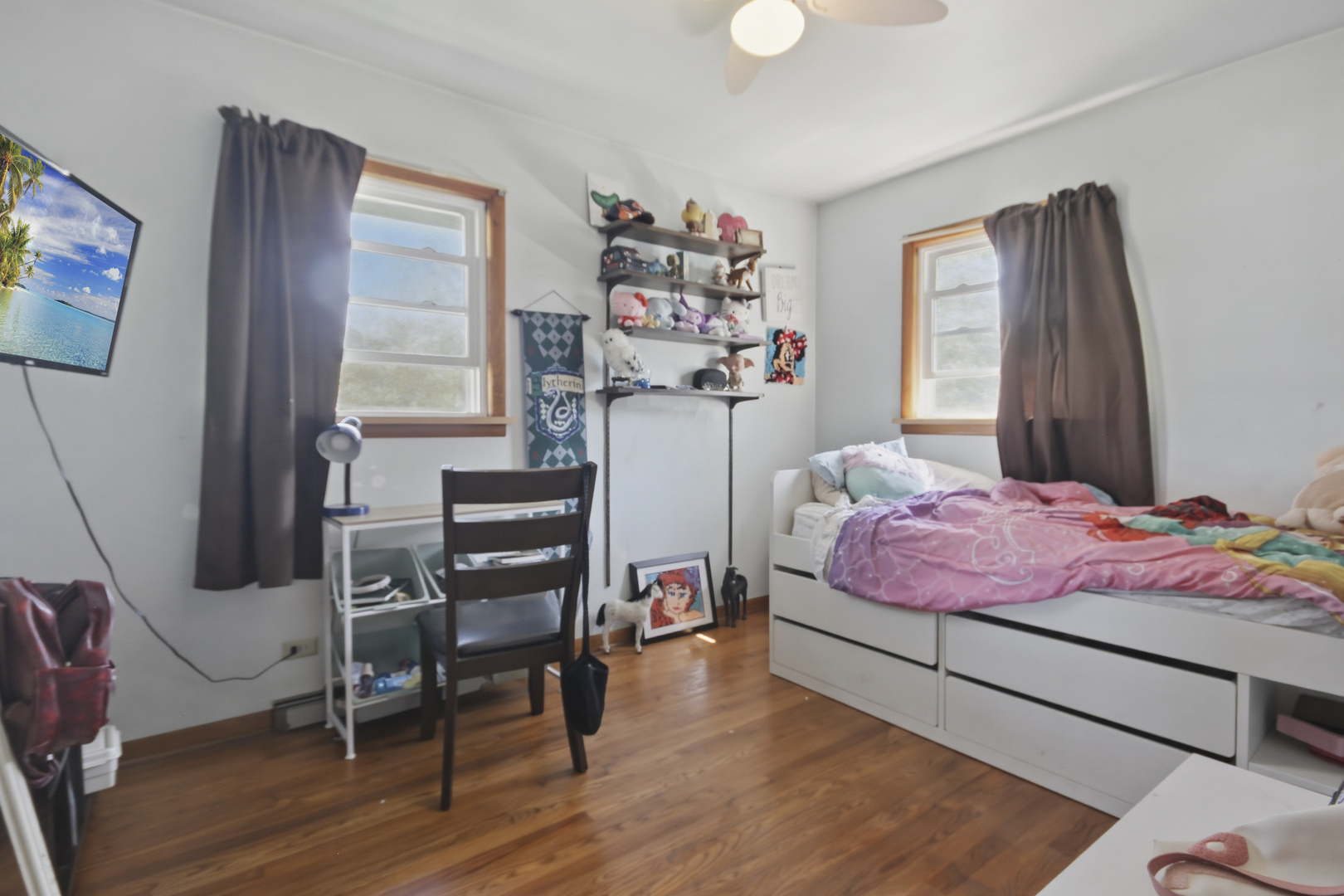 18655 Sherman Street Lansing, IL 60438 - Photo 13 of 21 a bedroom with a bed and a large window