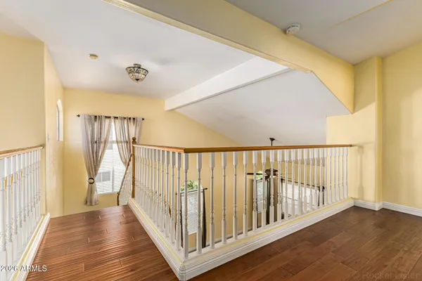 a view of a room with a kitchen