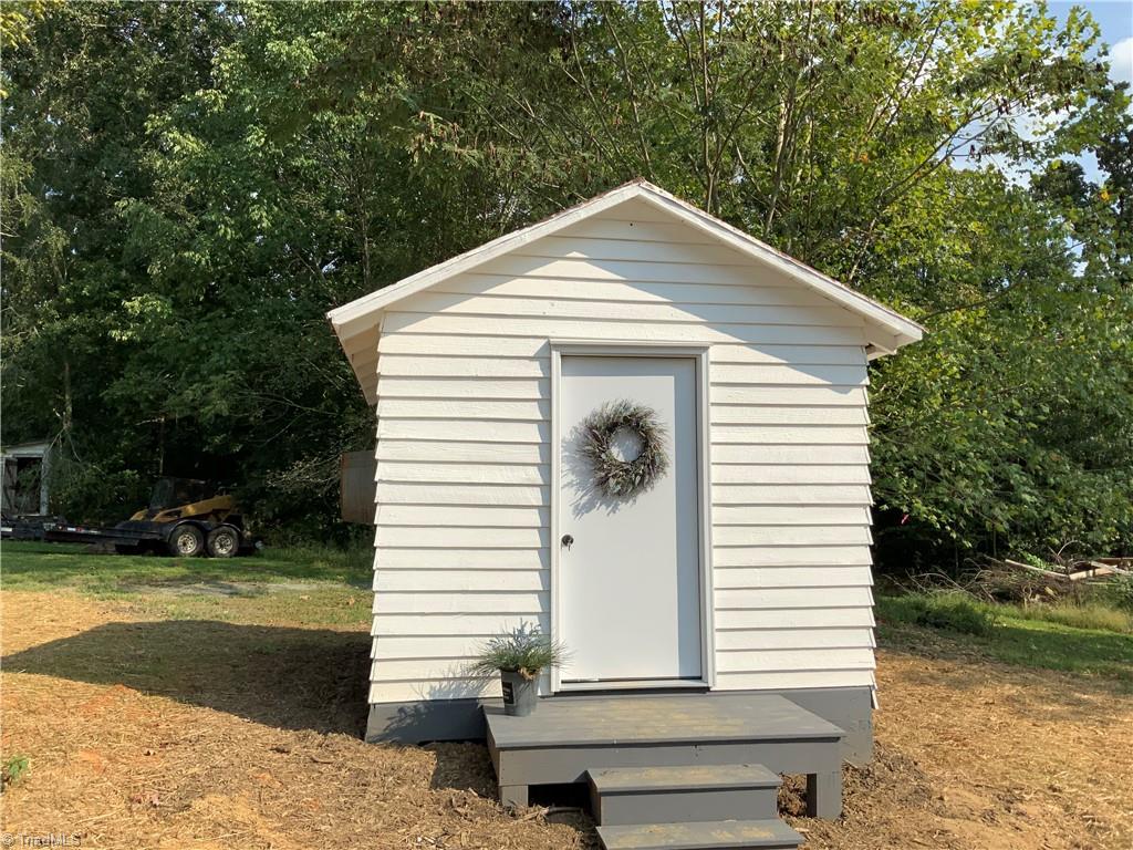 1333 Commonwealth Road Randleman, NC 27350 - Photo 9 of 28 Wired and insulated shed. Make a Great SHE SHED!