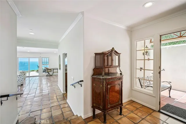 a view of a living room and dining room