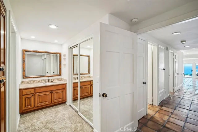 a view of front door with cabinet