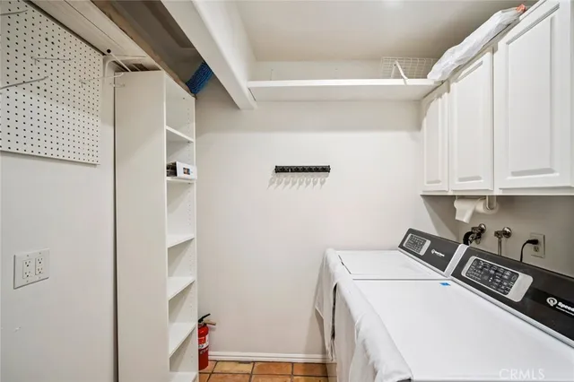 a bathroom with a sink a vanity and a mirror