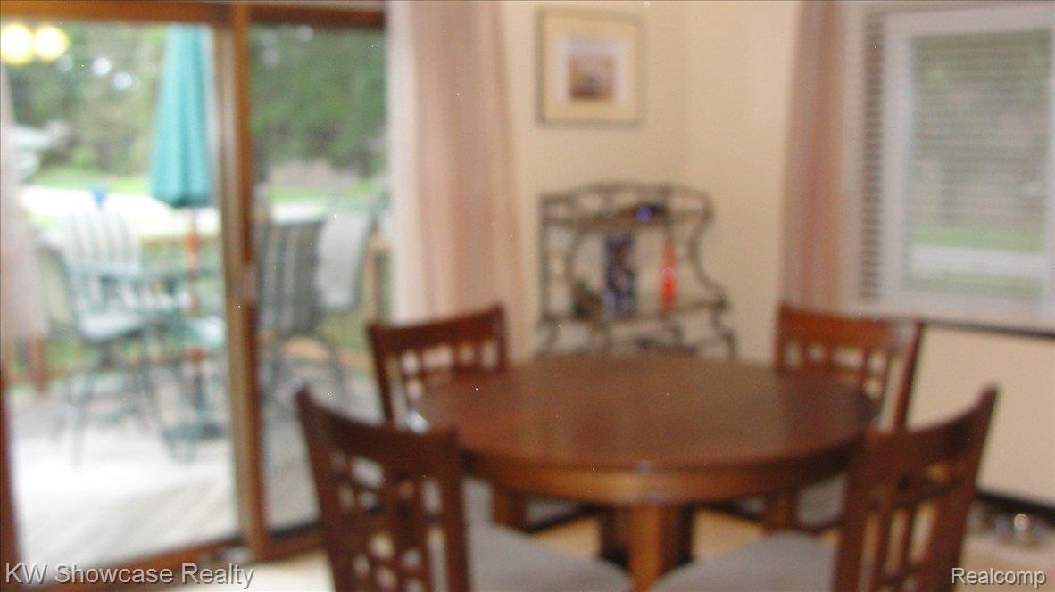 7599 Highland Road White Lake, MI 48383 - Photo 5 of 20 12x11 Breakfast Nook w/Door Wall