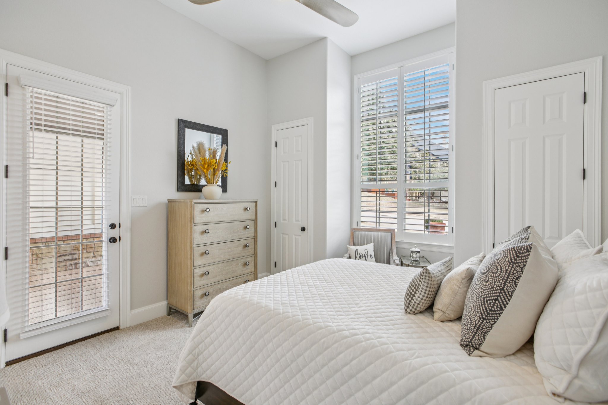 436 SANTALUZ Path Austin, TX 78732 - Photo 14 of 34 A second main-floor bedroom with a full bath creates an ideal arrangement for visitors or multi-generational living.
