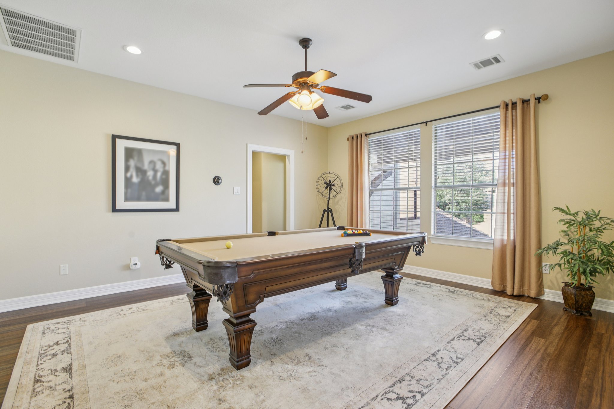 436 SANTALUZ Path Austin, TX 78732 - Photo 15 of 34 The upper level features a flex game room, providing a perfect secondary living area.