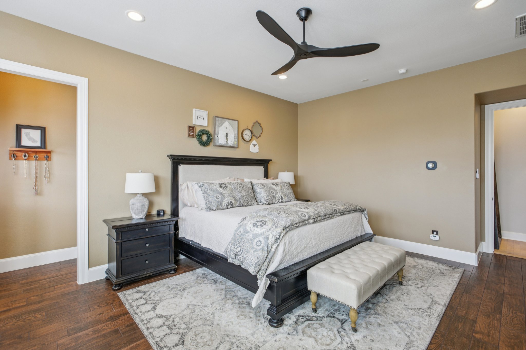 436 SANTALUZ Path Austin, TX 78732 - Photo 6 of 34 Solitude is easily found in the primary suite, conveniently located on the main level.