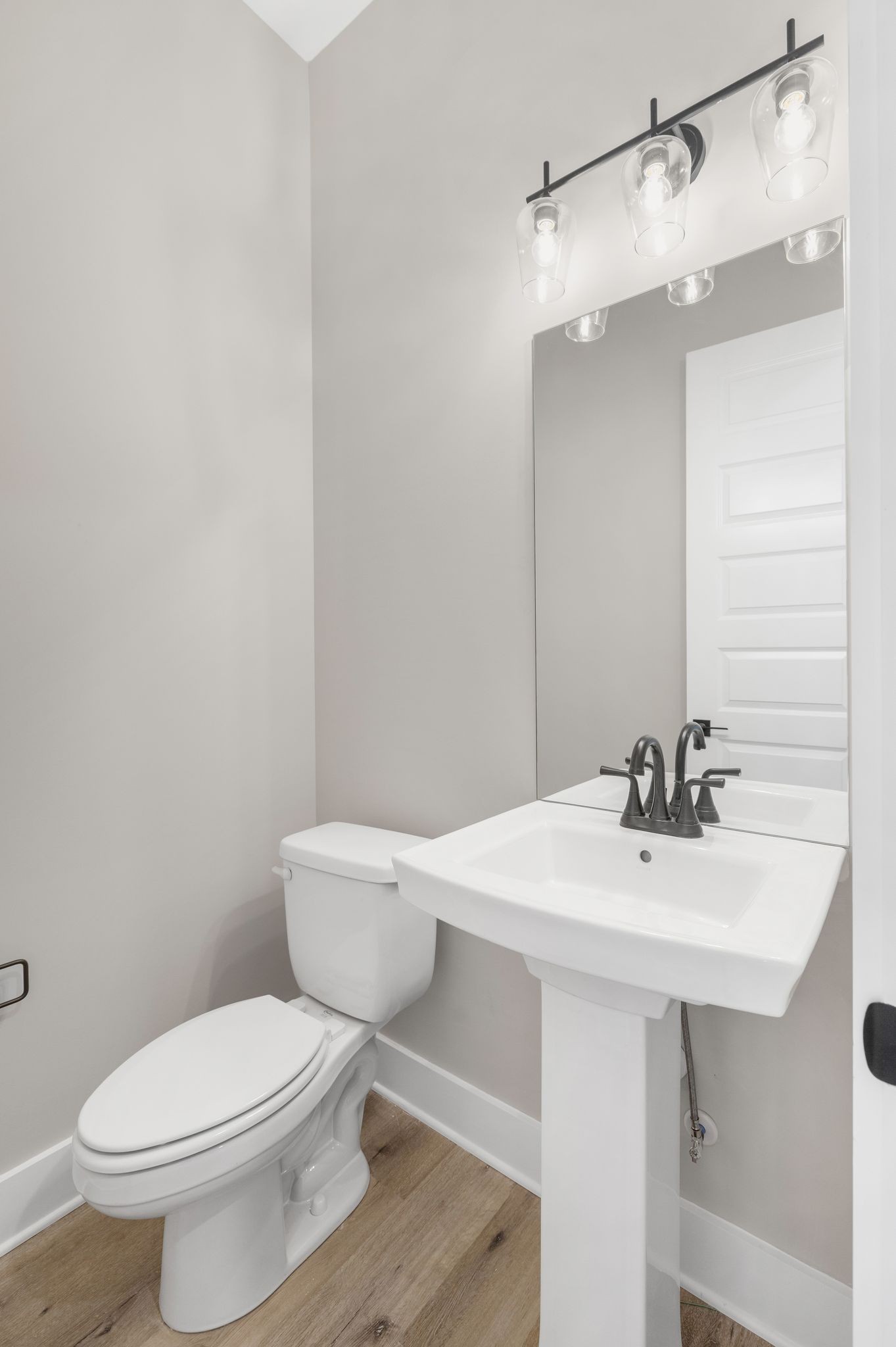 1694 McAfee Road Morrison, TN 37357 - Photo 25 of 41 a bathroom with a sink a toilet and shower