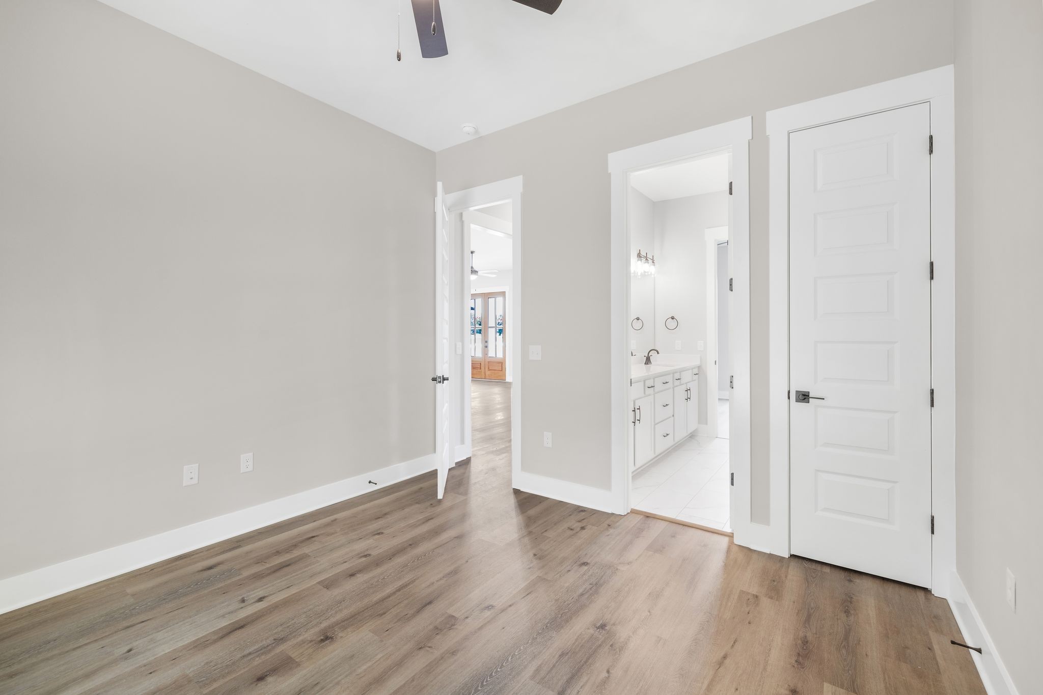 1694 McAfee Road Morrison, TN 37357 - Photo 27 of 41 wooden floor with white walls