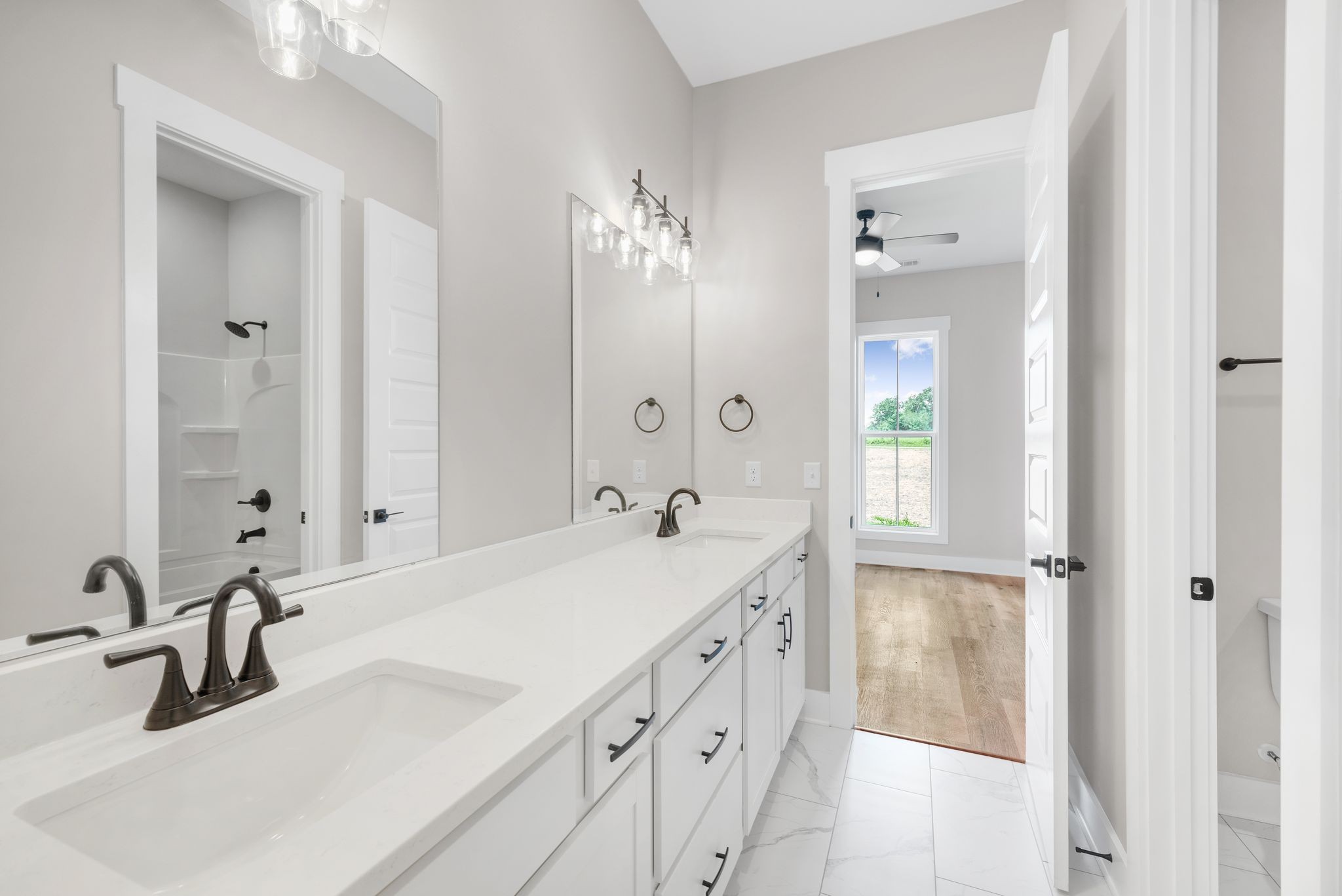 1694 McAfee Road Morrison, TN 37357 - Photo 28 of 41 a bathroom with a sink and a mirror