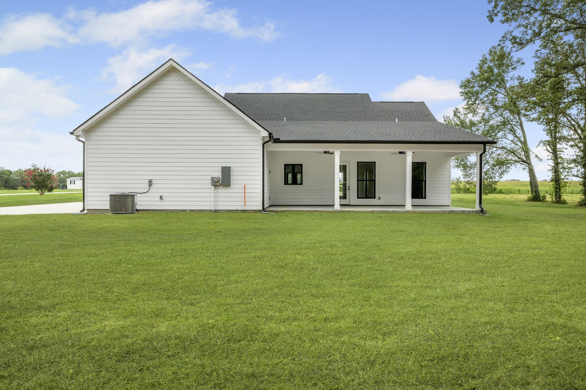 1694 McAfee Road Morrison, TN 37357 - Photo 32 of 41 a front view of house with yard and trees