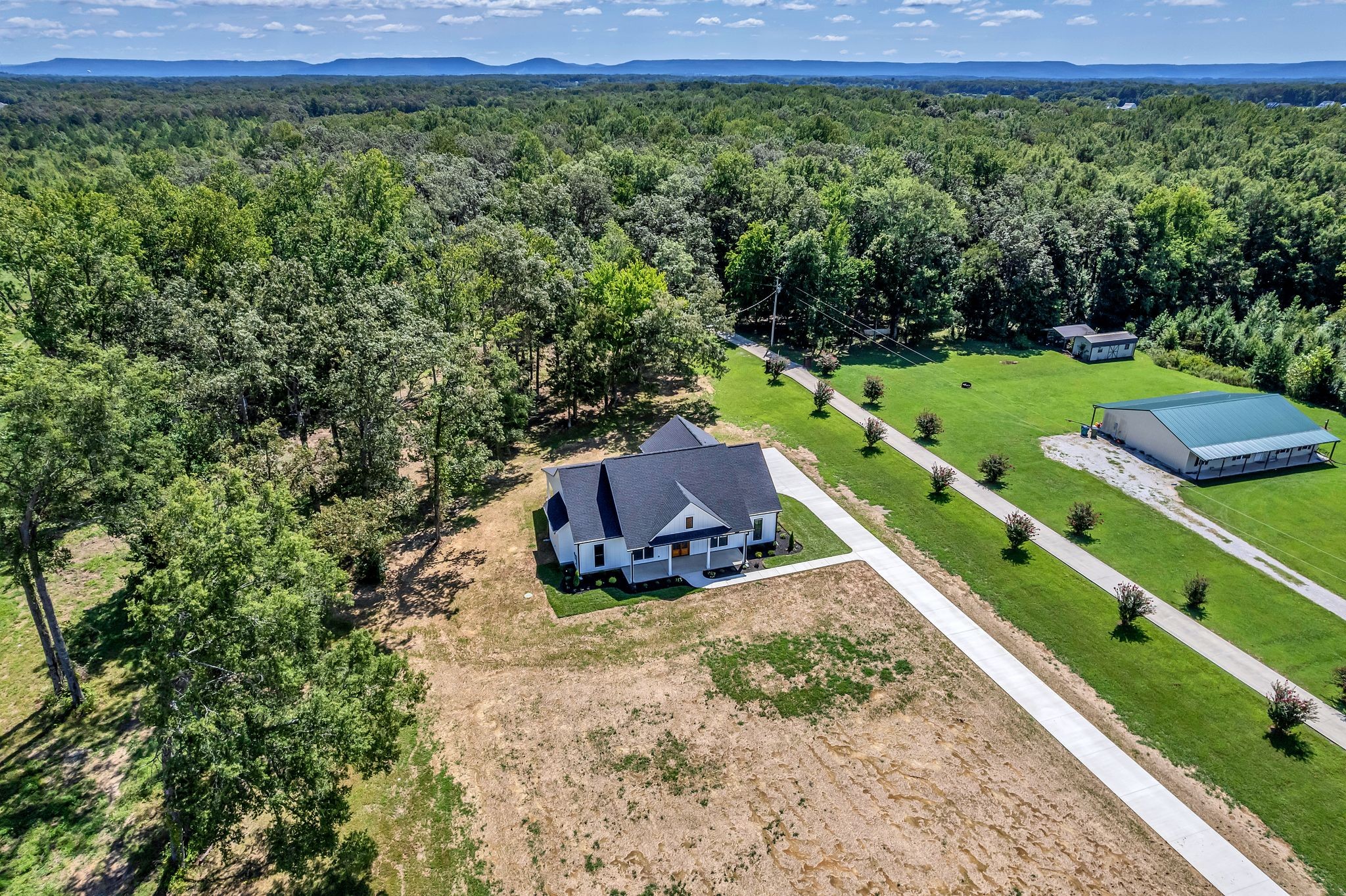 1694 McAfee Road Morrison, TN 37357 - Photo 37 of 41 a view of a yard with an outdoor space