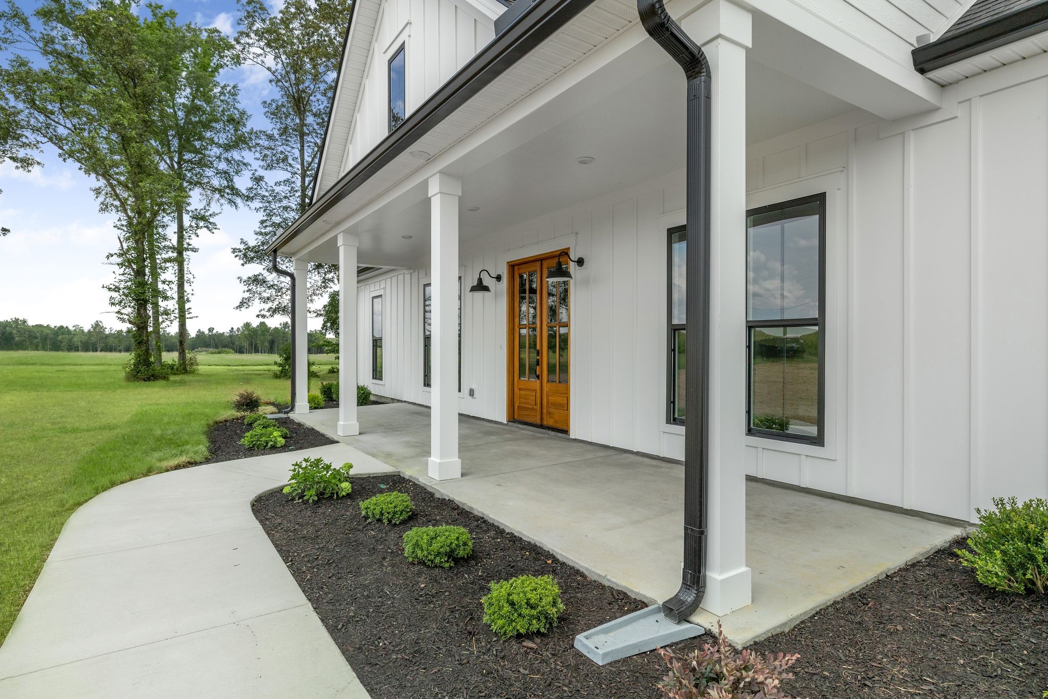 1694 McAfee Road Morrison, TN 37357 - Photo 5 of 41 a front view of a house with a yard