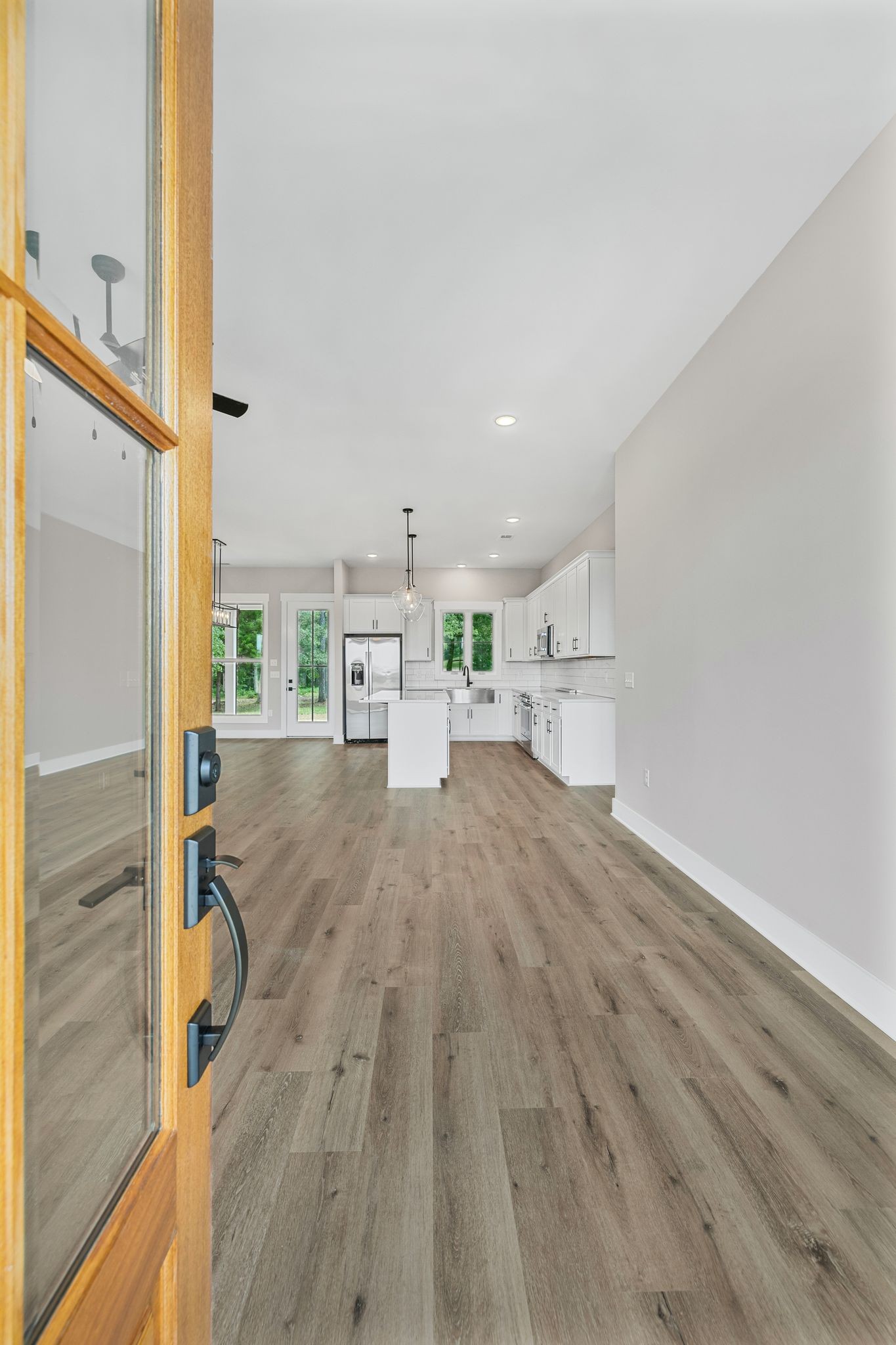 1694 McAfee Road Morrison, TN 37357 - Photo 7 of 41 a view of empty room with wooden floor