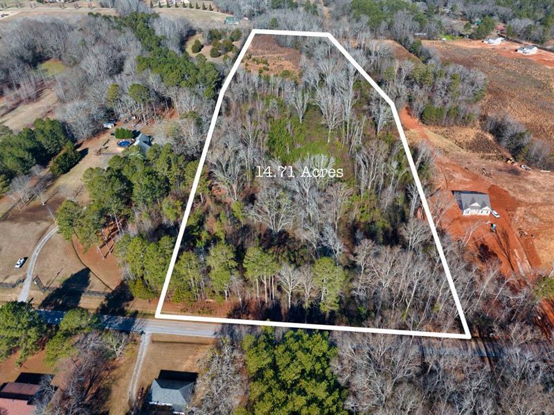1440 Pleasant Valley Road Monroe, GA 30655 - Photo 1 of 1 an aerial view of a house