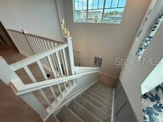 a view of a kitchen and a living room