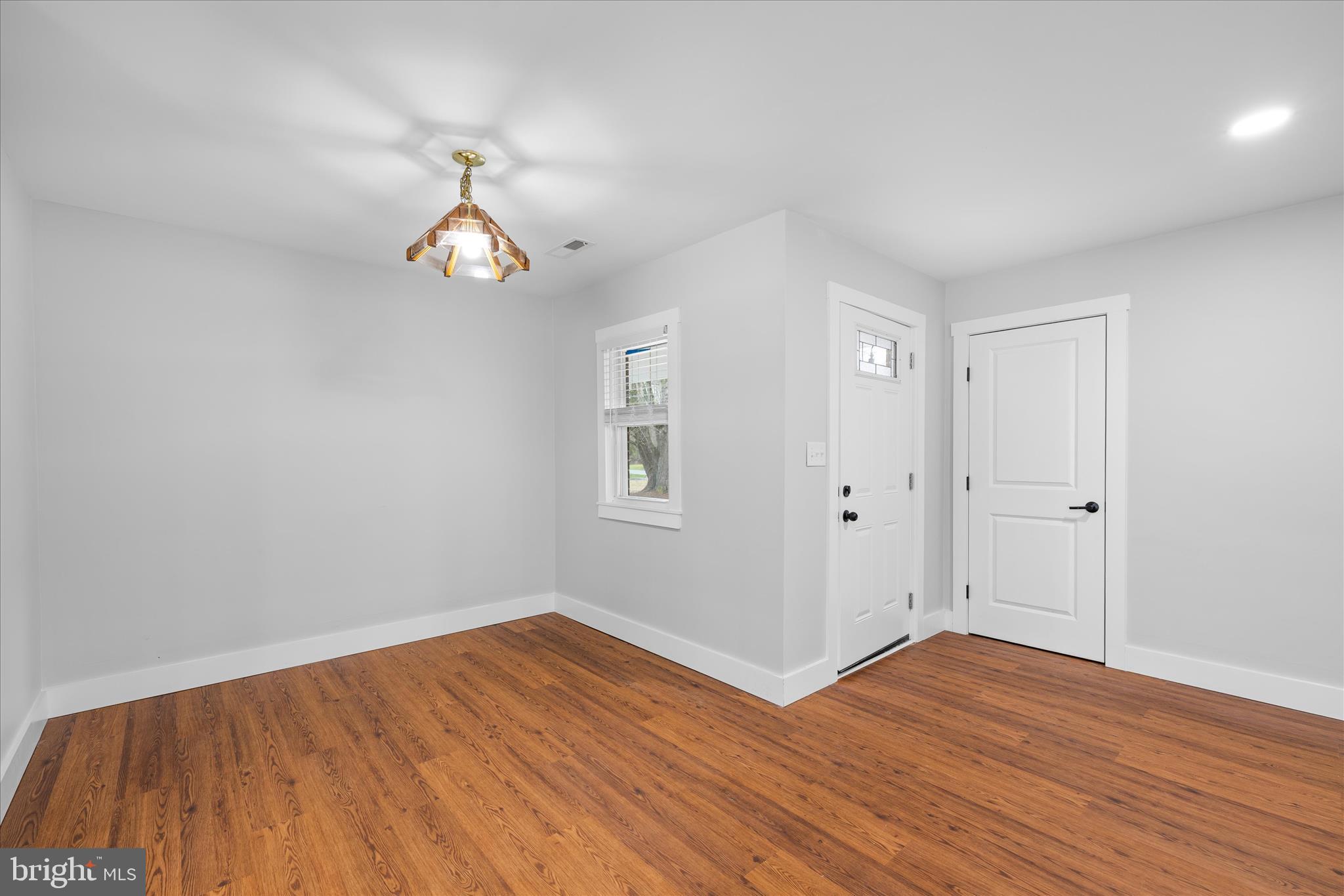 24163 Old Meadow Road Seaford, DE 19973 - Photo 20 of 98 Versatile front room with hardwood floors