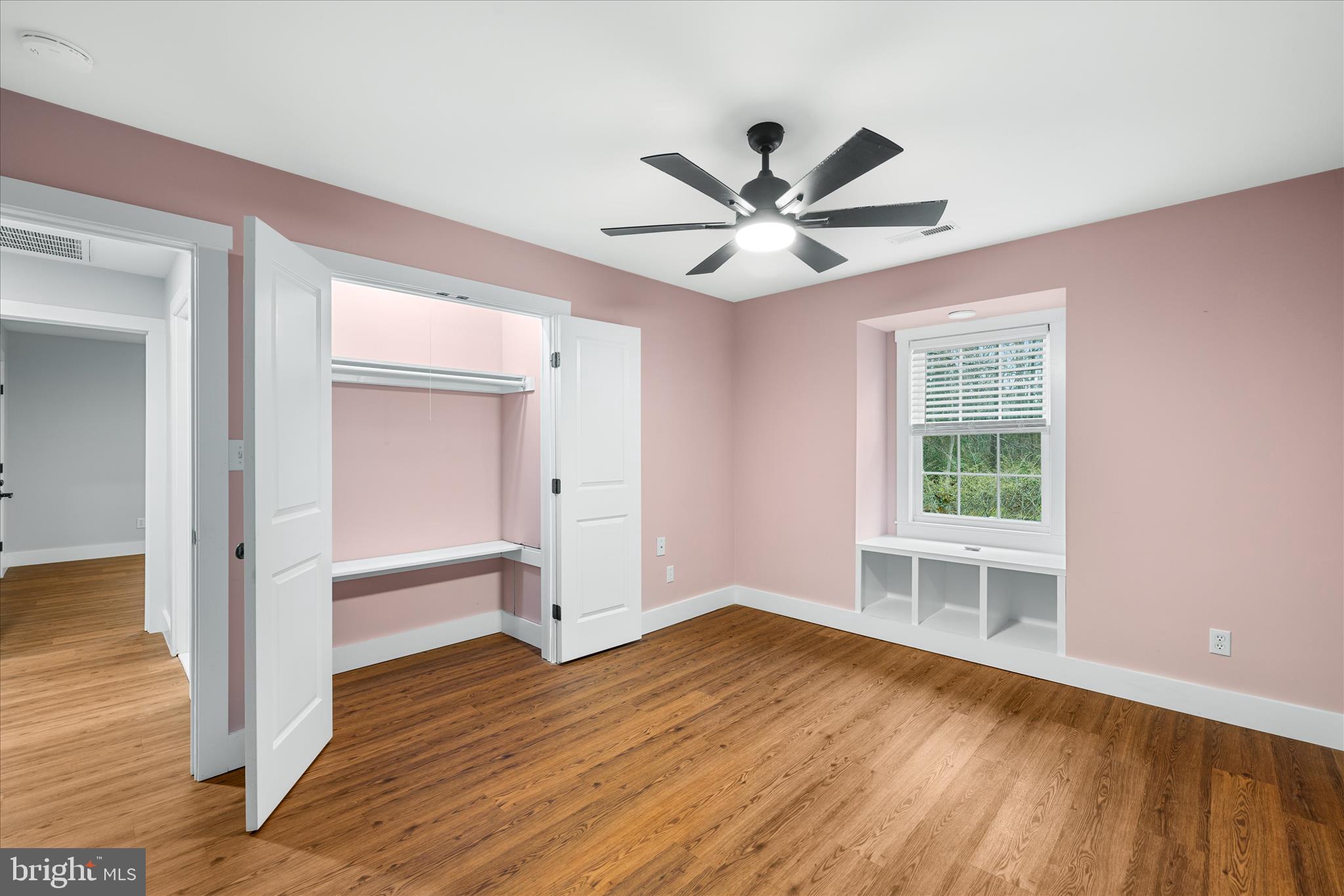 24163 Old Meadow Road Seaford, DE 19973 - Photo 29 of 98 Bedroom 2 with ceiling fan and soft natural light