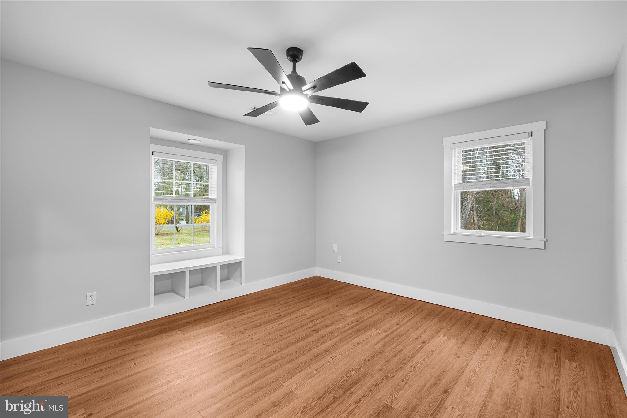 24163 Old Meadow Road Seaford, DE 19973 - Photo 36 of 98 Bedroom 3 with ceiling fan and hardwood floors