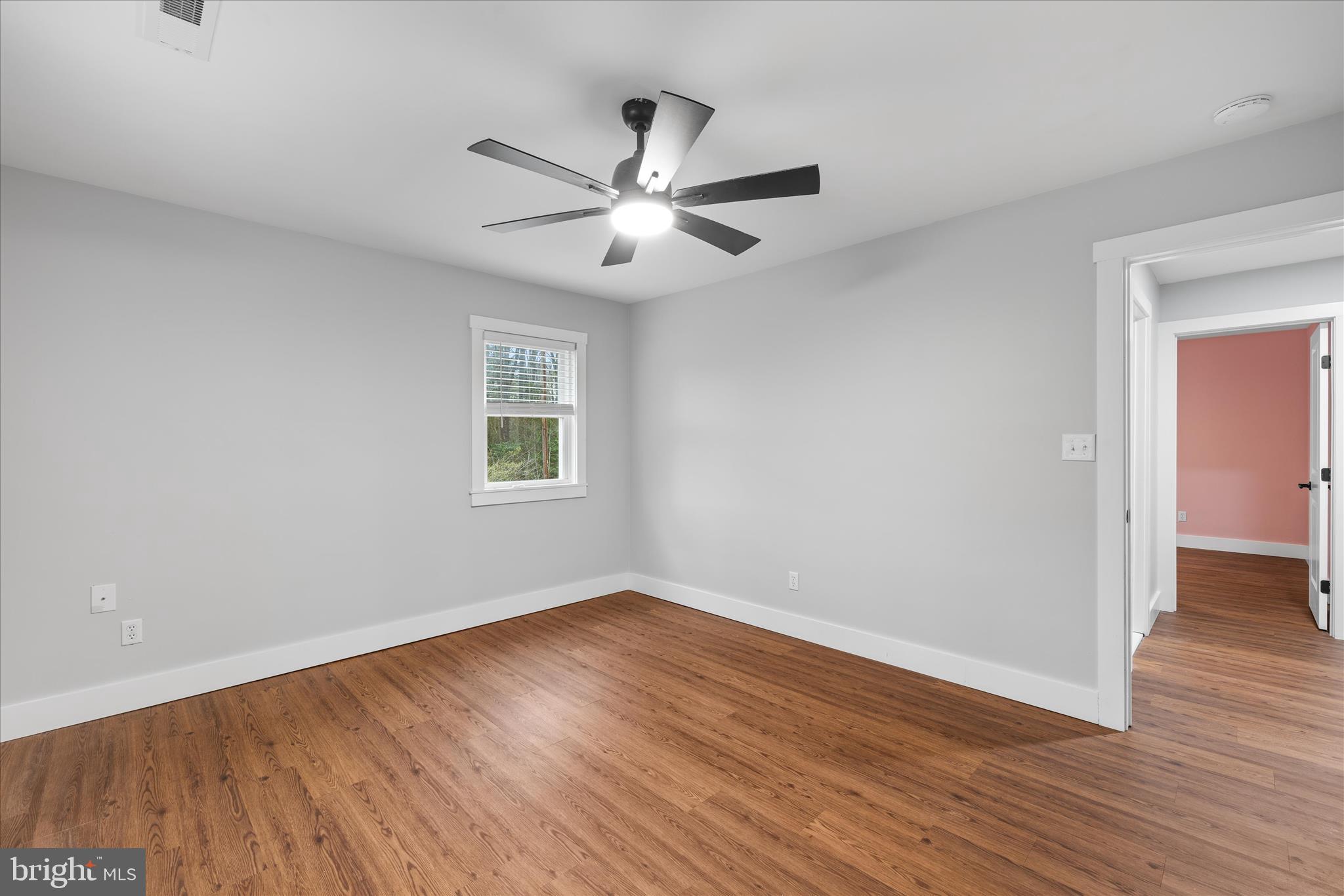 24163 Old Meadow Road Seaford, DE 19973 - Photo 38 of 98 Spacious Bedroom 3 with clean modern finishes