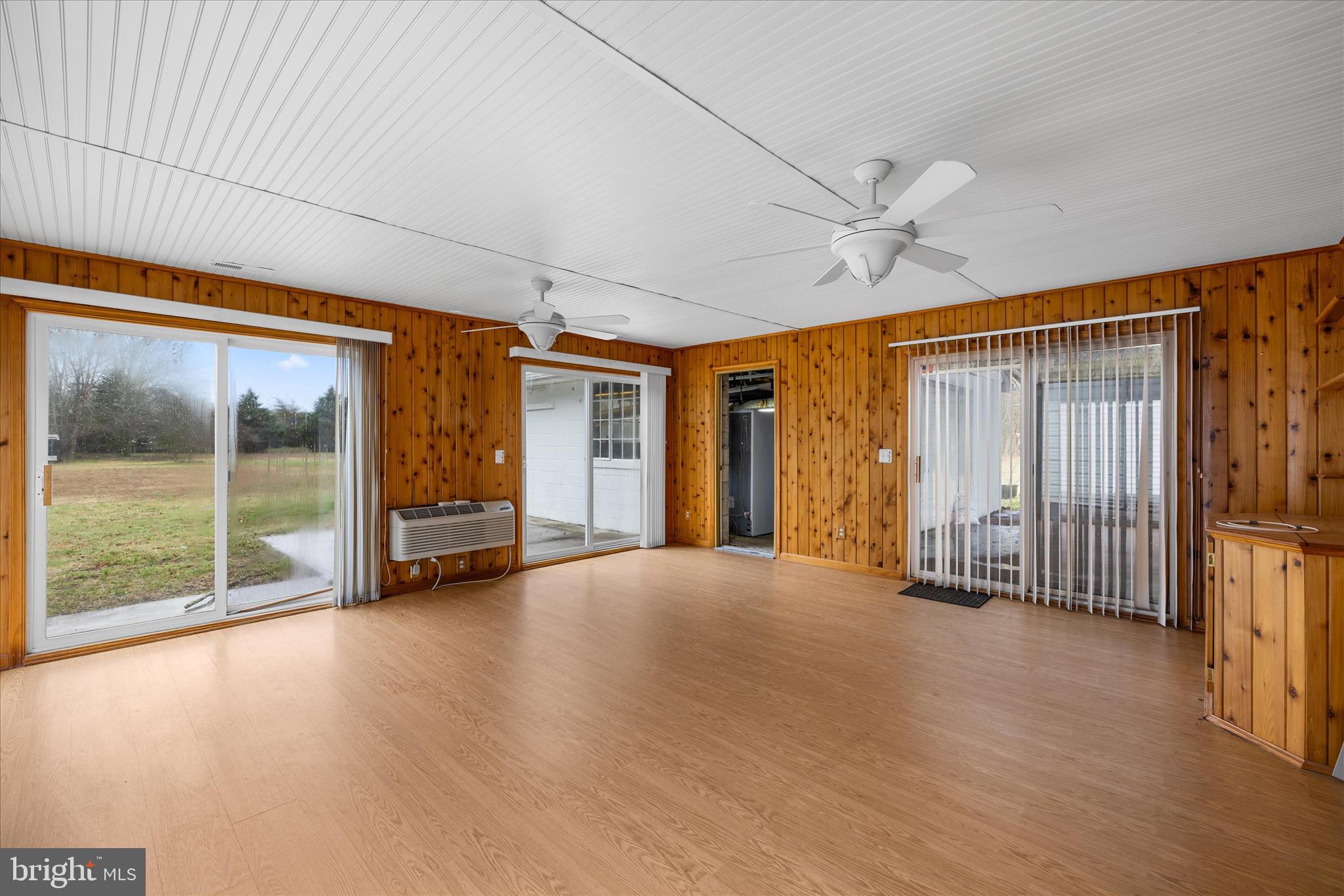 24163 Old Meadow Road Seaford, DE 19973 - Photo 44 of 98 Spacious sunroom with walls of windows