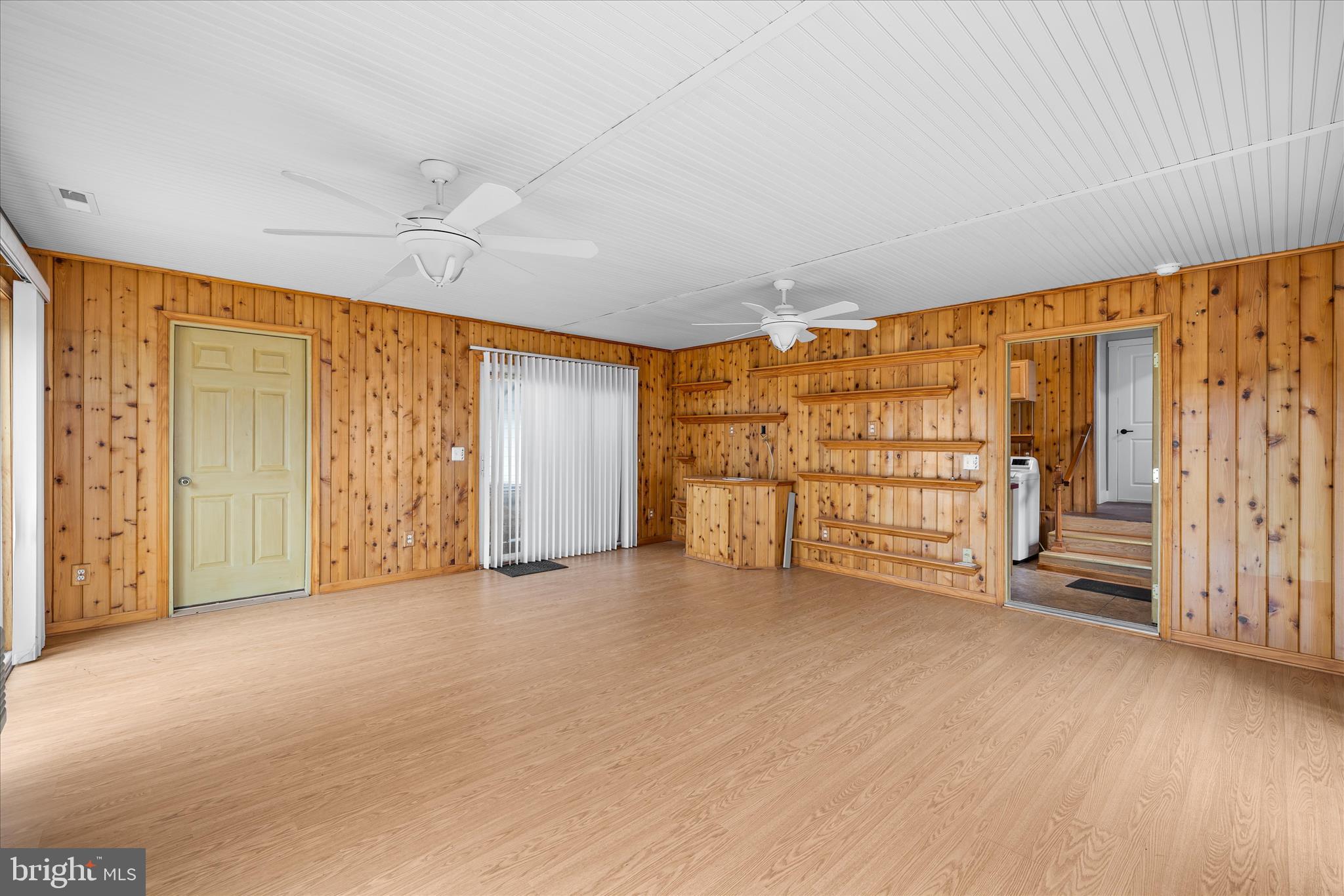 24163 Old Meadow Road Seaford, DE 19973 - Photo 45 of 98 Rustic sunroom with expansive gathering space