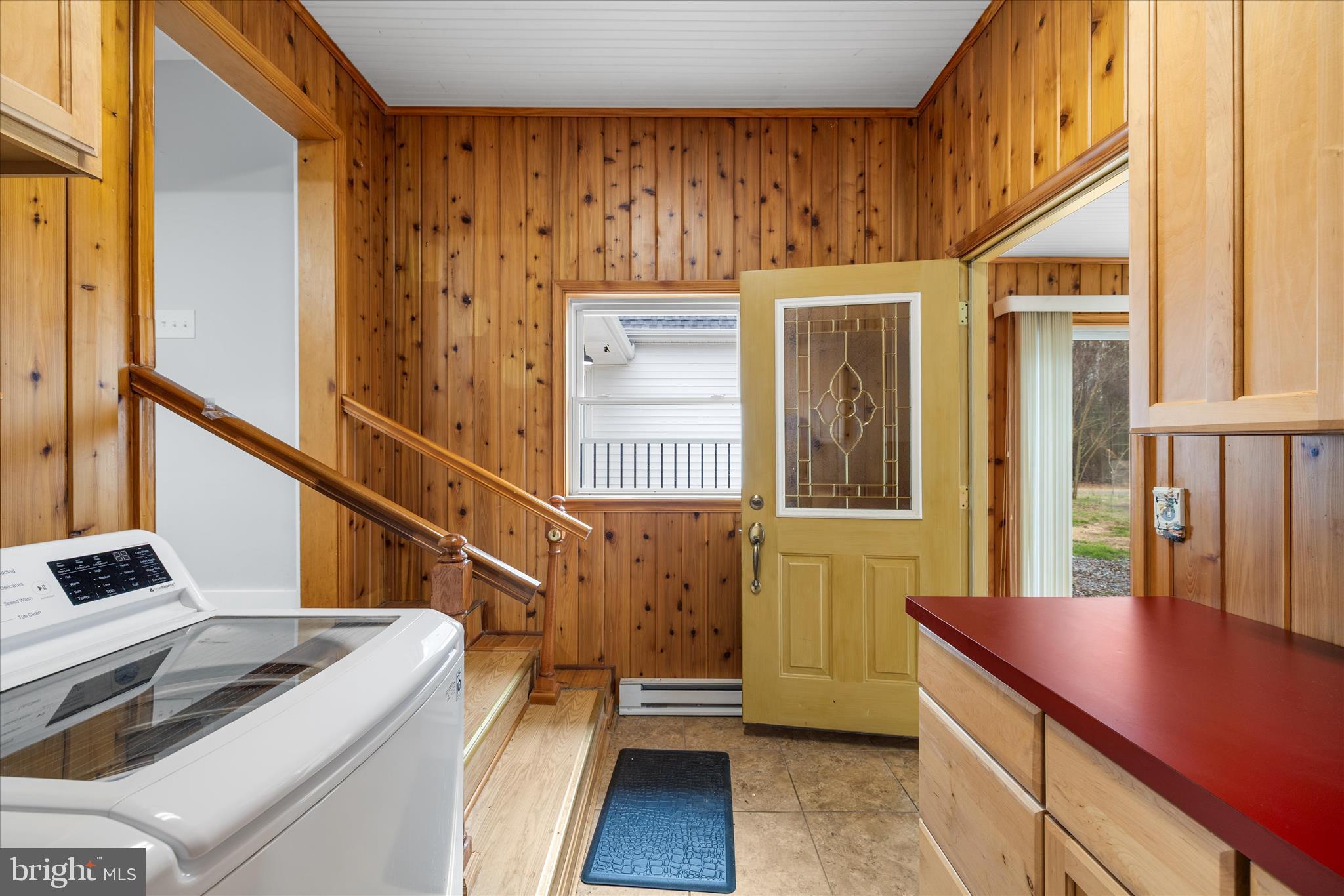 24163 Old Meadow Road Seaford, DE 19973 - Photo 49 of 98 Laundry area with workspace and exterior access