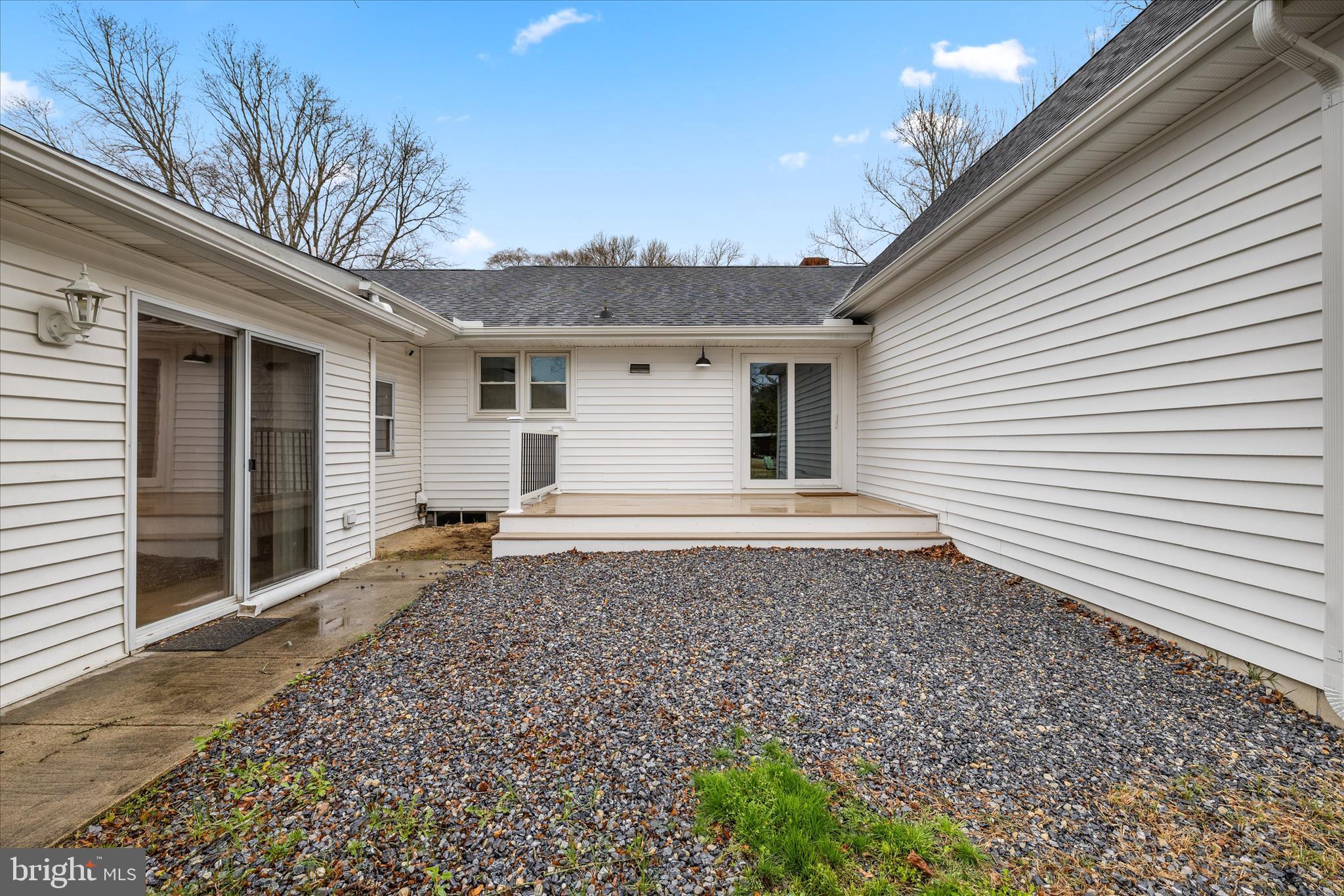 24163 Old Meadow Road Seaford, DE 19973 - Photo 50 of 98 Rear patio and deck offer outdoor enjoyment