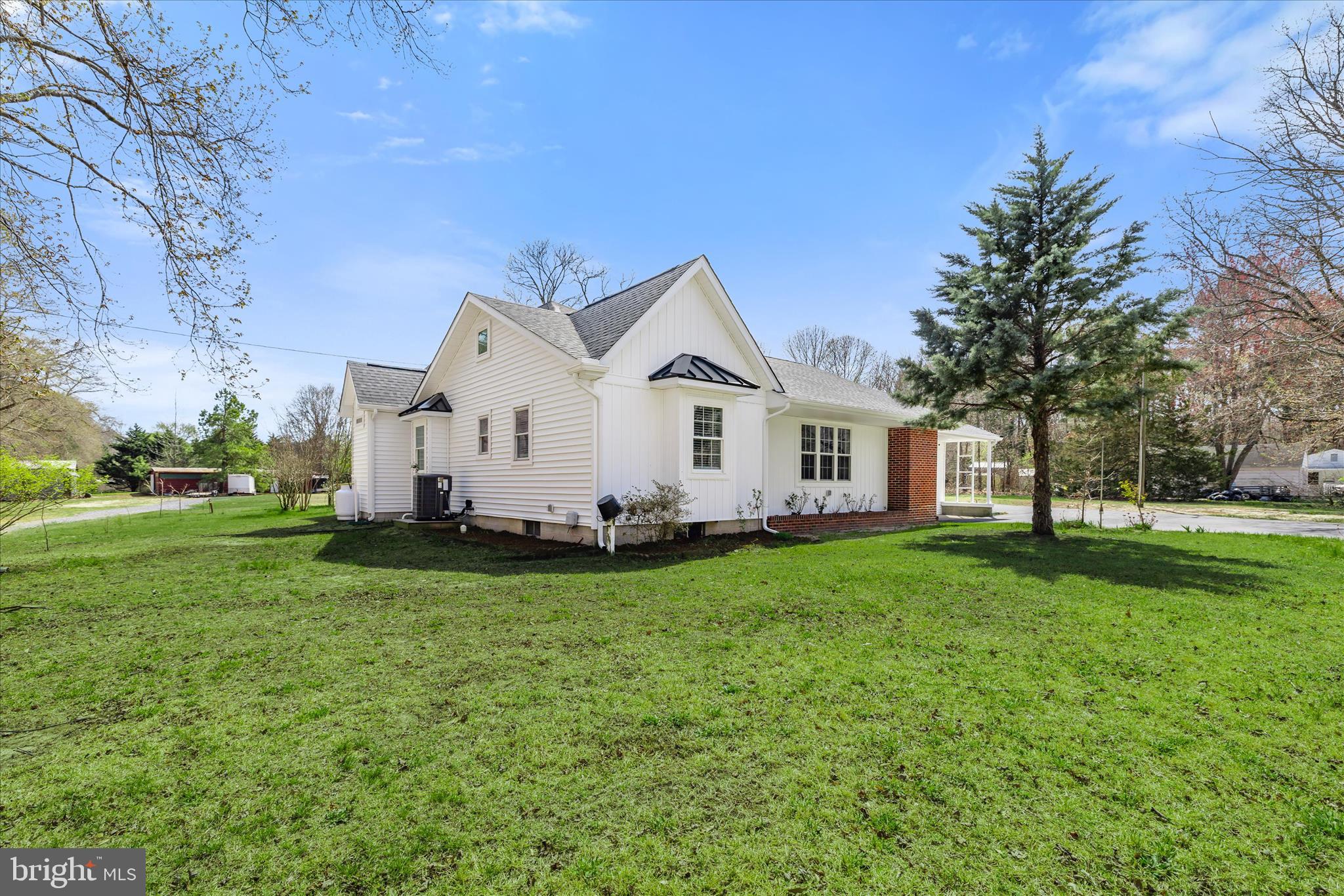 24163 Old Meadow Road Seaford, DE 19973 - Photo 9 of 98 Spacious yard surrounds this charming home