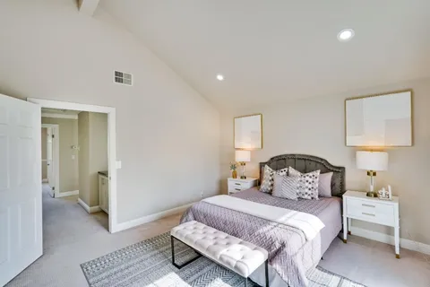 a bathroom with a sink vanity and a mirror
