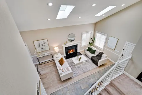 a bathroom with a granite countertop sink mirror and double
