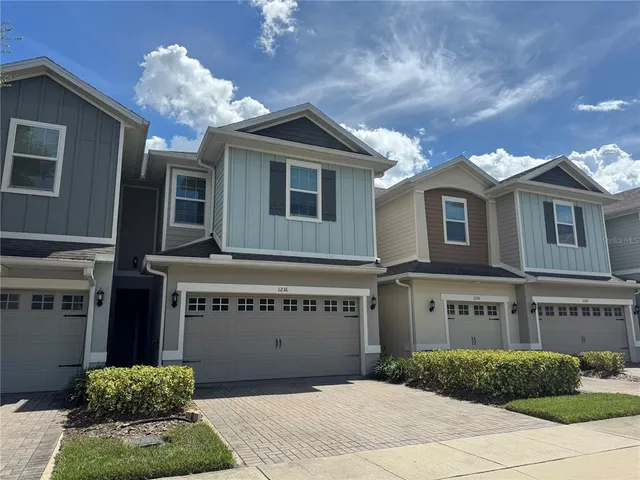 a view of a house with a garage