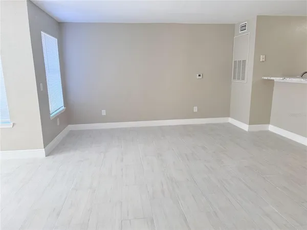 a view of an empty room with window