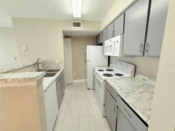 a bathroom with a toilet and shower