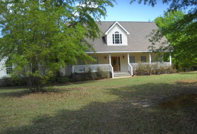 859 Bowen Hill Road Haddock, GA 31033 - Photo 1 of 1 front view of a house with a yard