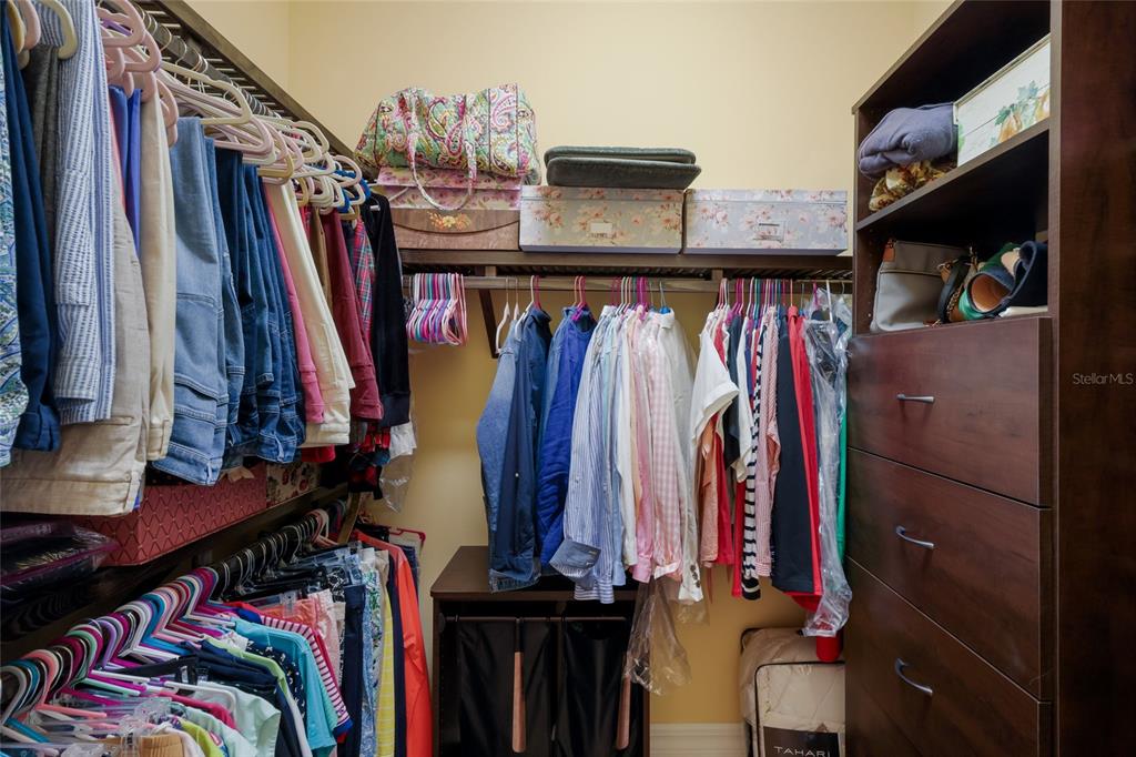 5011 Tobermory Way Bradenton, FL 34211 - Photo 18 of 77 a view of walk in closet with clothes