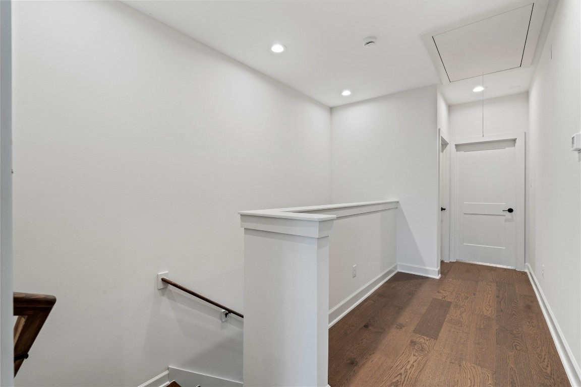 4710 Moving Meadows Houston, TX 77018 - Photo 27 of 42 A view of the third-floor hallway that connects the primary bedroom, secondary bedroom, and the laundry room.
