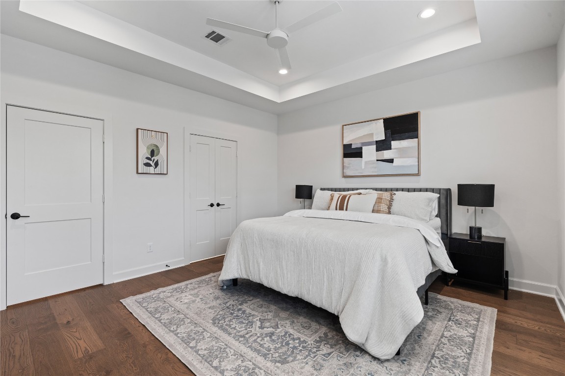 4710 Moving Meadows Houston, TX 77018 - Photo 29 of 42 The primary bedroom highlights plenty of space to design the room the way you want- comfortably fitting a bed, nightstands, and even extra seating.