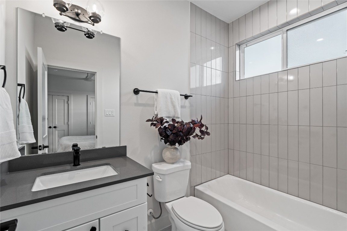 4710 Moving Meadows Houston, TX 77018 - Photo 35 of 42 With its own en-suite bathroom, the secondary bedroom feels more private and functional, giving anyone who uses it easy access without having to leave the room.