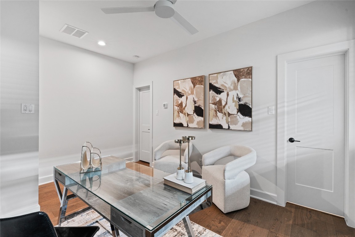 4710 Moving Meadows Houston, TX 77018 - Photo 8 of 42 Another view of the first floor office that has it's own private en-suite and walk in closet with warm tones and wide plank luxury vinyl floors.