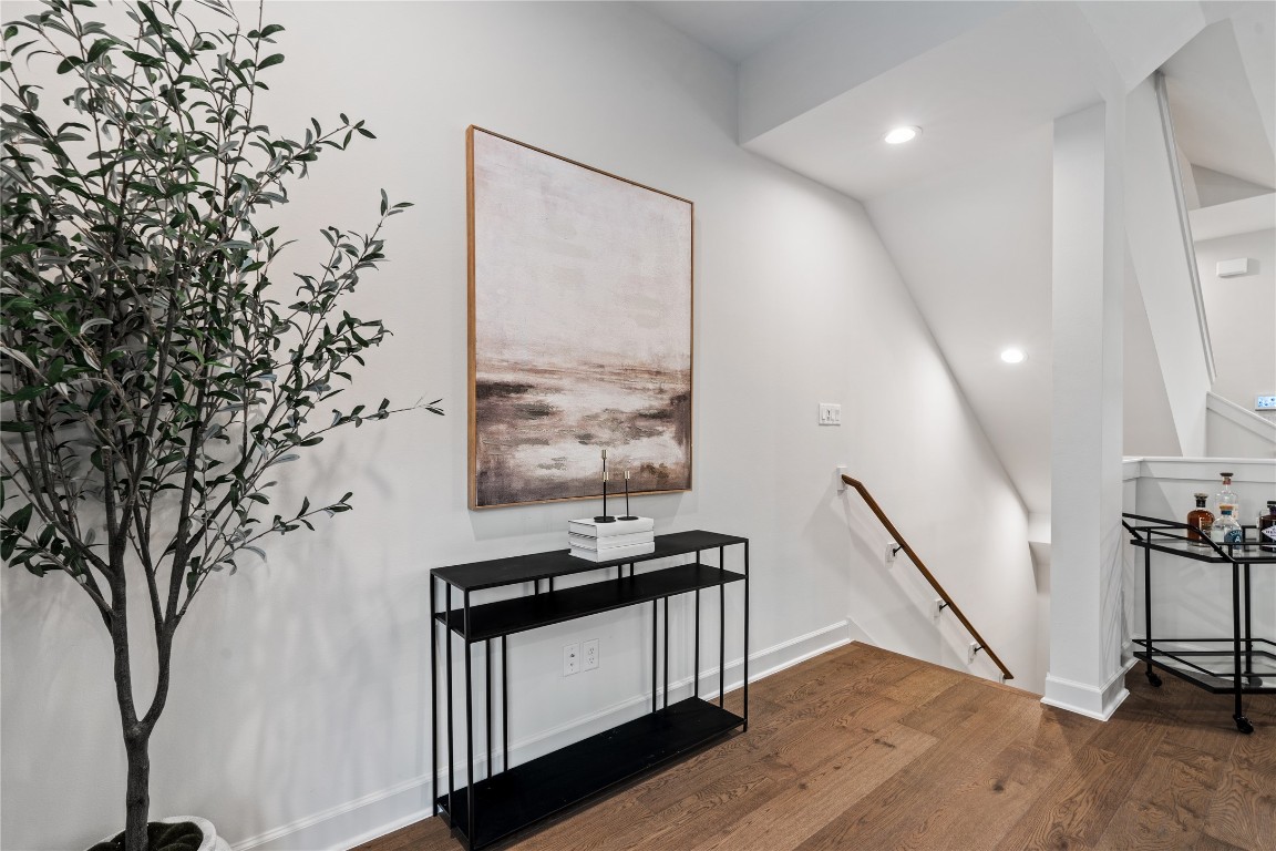 4710 Moving Meadows Houston, TX 77018 - Photo 10 of 42 Thoughtful small details are provided as you enter the second floor living area with space to create your own whether it's a credenza or small bar area that gives each homeowner the ability to create their own personal touch.