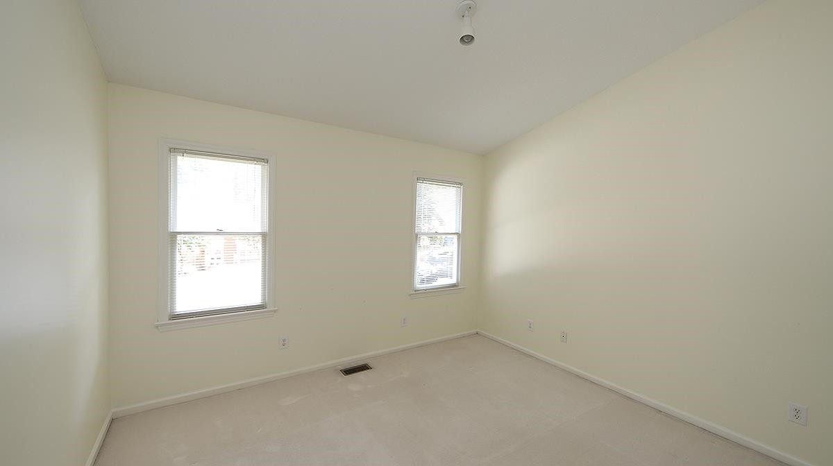 4520 Antique Lane Raleigh, NC 27616 - Photo 9 of 13 The secondary bedroom faces the front and could make a great home office! Secondary Bedroom