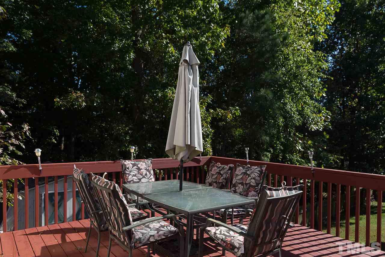 4529 Moss Spring Drive Raleigh, NC 27616 - Photo 20 of 21 a view of a chairs and table in the roof deck