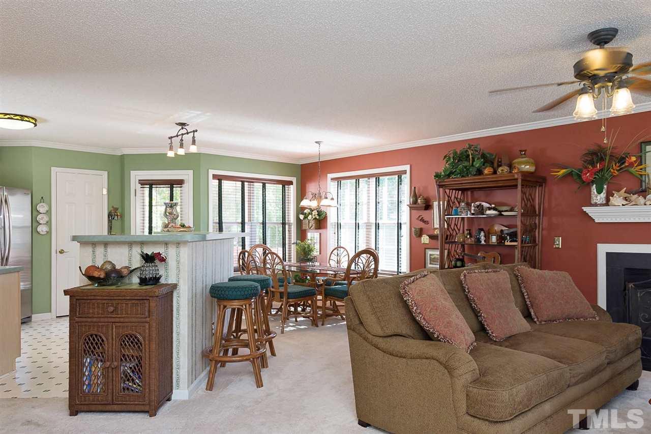 4529 Moss Spring Drive Raleigh, NC 27616 - Photo 4 of 21 a living room with furniture and wooden floor