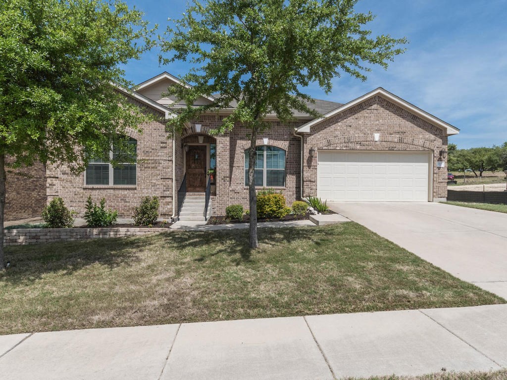 Beautiful curb appeal with landscaped beds and nicely manicured yard!