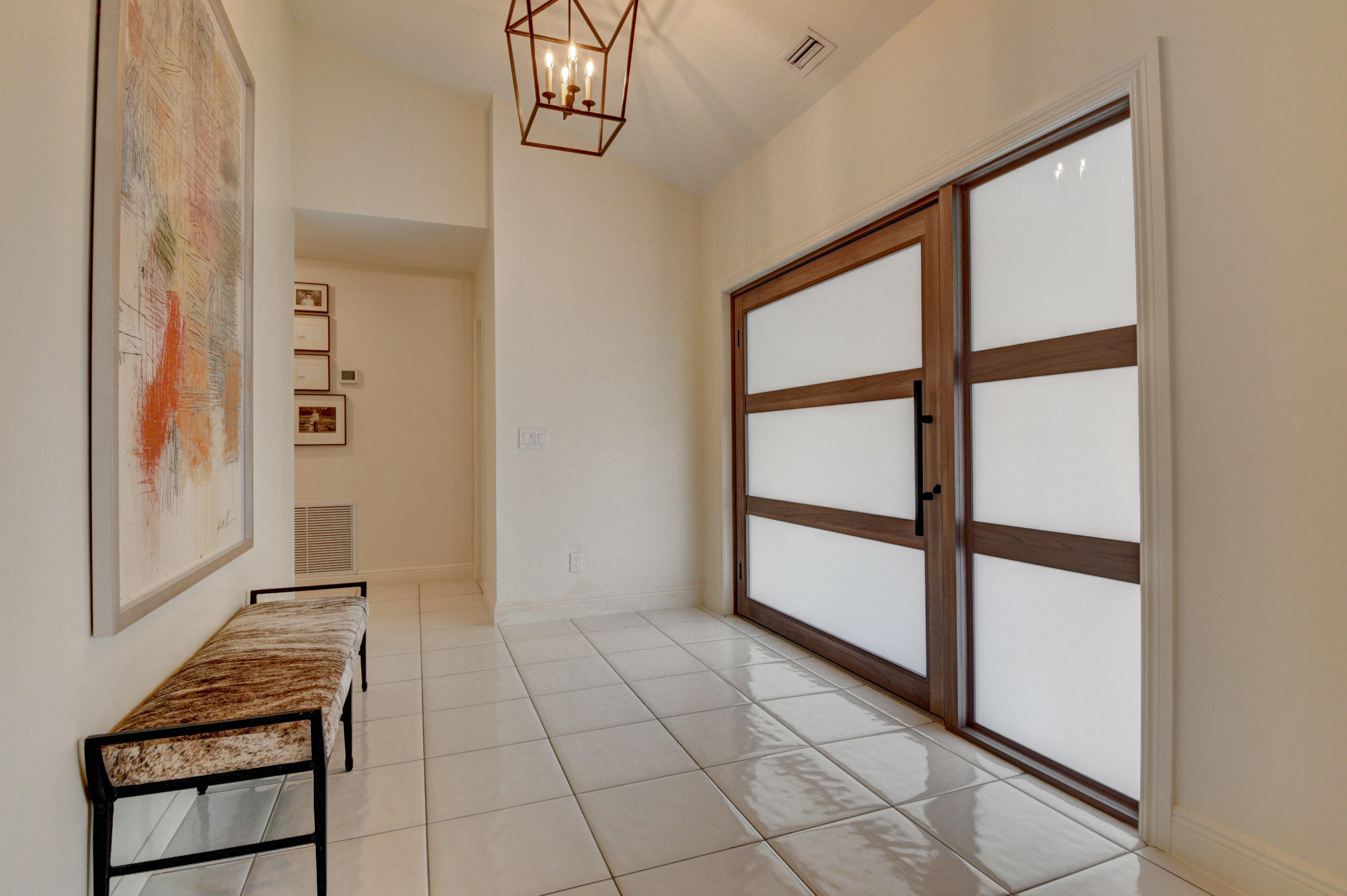 7624 Marbella Terrace Boca Raton, FL 33433 - Photo 4 of 55 a view of an empty room with windows