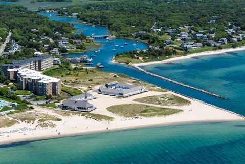 a view of a backyard with table and chairs