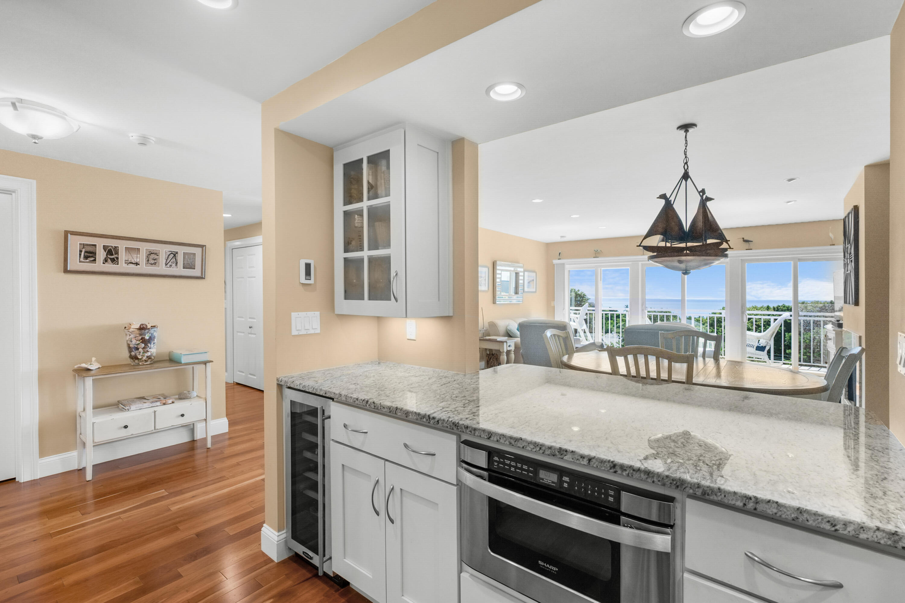 1 Belmont Road, Unit 542 West Harwich, MA 02671 - Photo 11 of 48 a kitchen with granite countertop a sink stainless steel appliances and cabinets