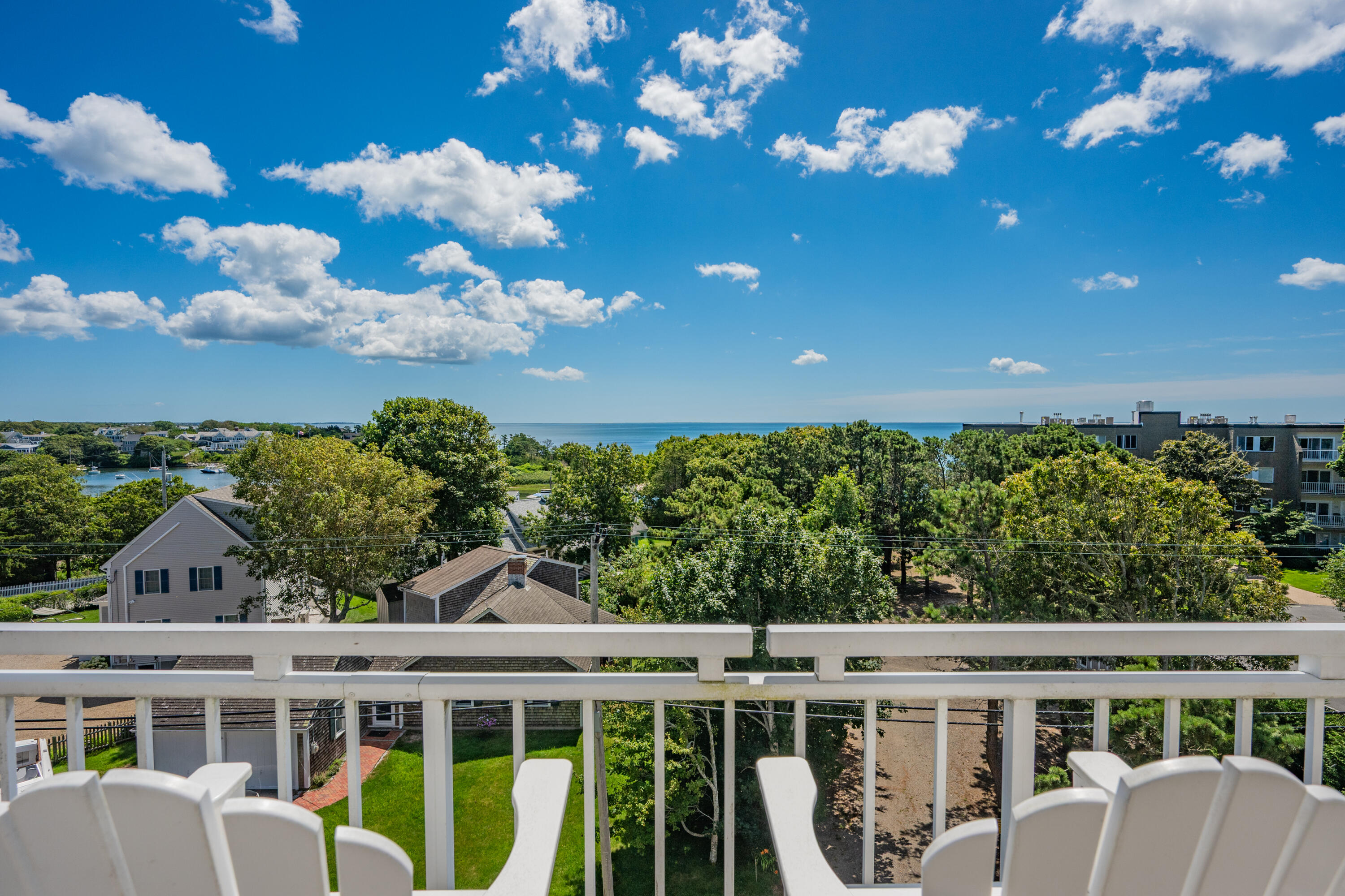 1 Belmont Road, Unit 542 West Harwich, MA 02671 - Photo 18 of 48 a view of a house with a flower garden